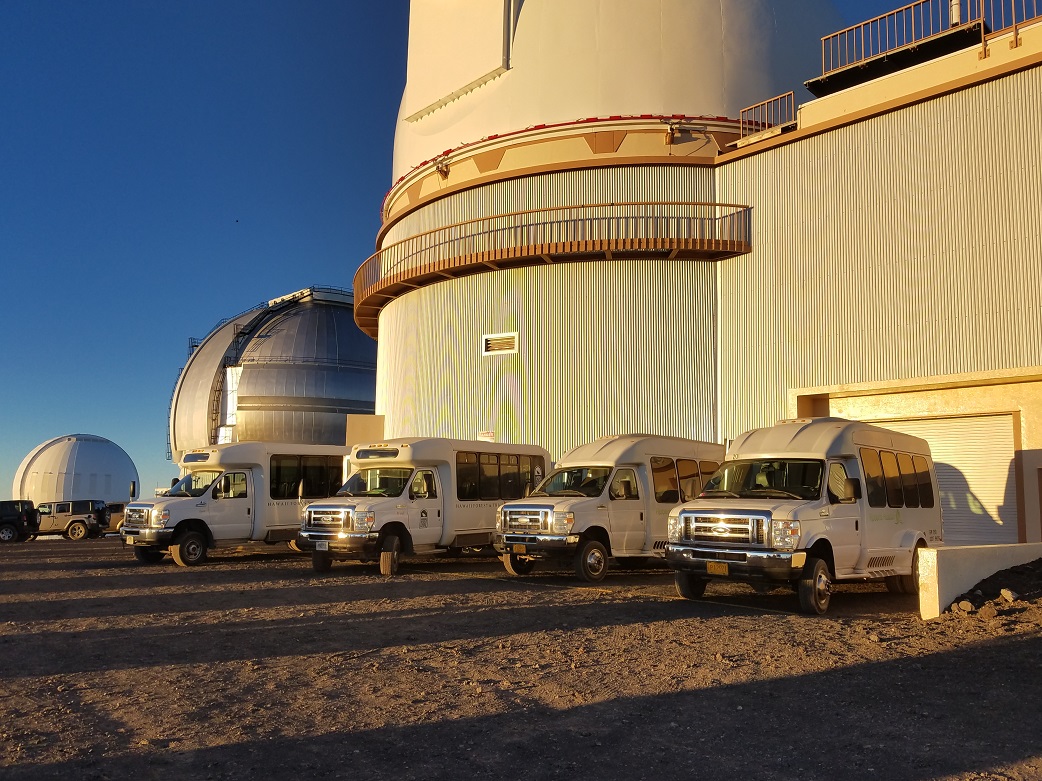 Tour vans parked at the summit